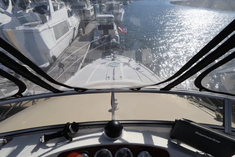 Slide: The Image of View from 2005 Meridian 459 Motoryacht cockpit, overlooking marina and water. - 31