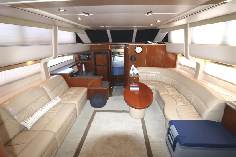 Slide: The Image of Luxurious interior of 2005 Meridian 459 Motoryacht with beige leather seating and modern amenities. - 34