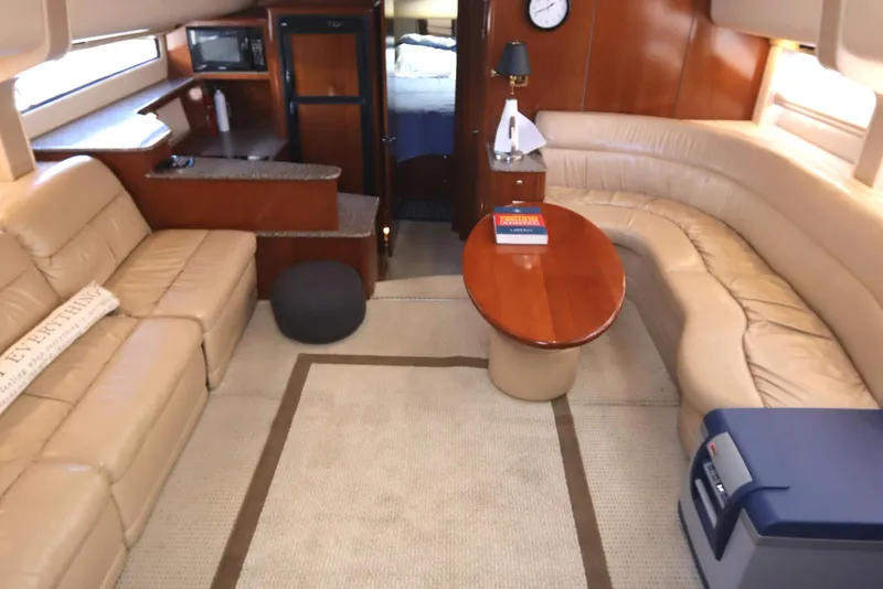 Slide: The Image of Luxurious interior of 2005 Meridian 459 Motoryacht with beige seating and wooden accents. - 35