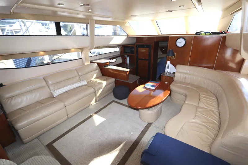 Slide: The Image of Luxurious interior of 2005 Meridian 459 Motoryacht with leather seating and elegant wood finishes. - 37