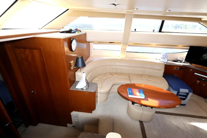 Slide: The Image of Luxurious interior of 2005 Meridian 459 Motoryacht with plush seating and elegant wood finishes. - 39