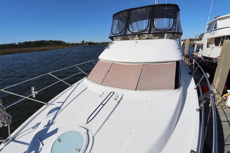 Slide: The Image of 2005 Meridian 459 Motoryacht docked on a sunny day. - 4