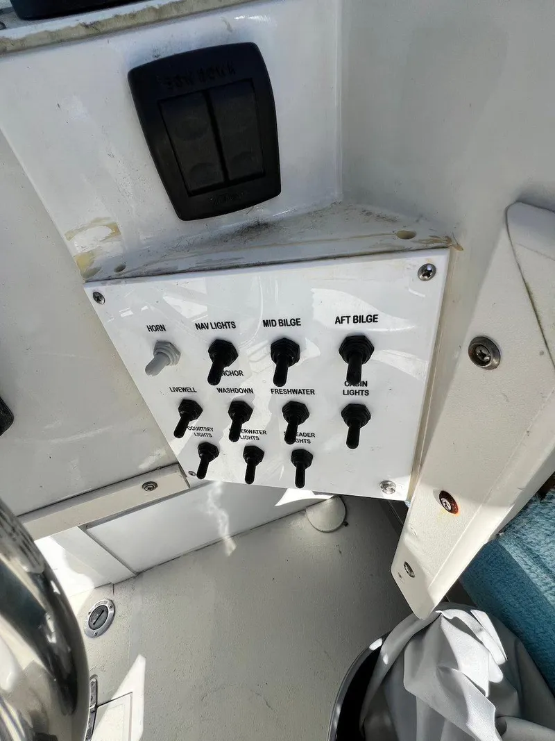 Slide: The Image of Control panel of 1988 Grady-White 25 SAILFISH boat with switches and labels. - 15