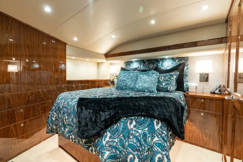 Slide: The Image of Luxurious bedroom interior of 2021 Viking 68 Enclosed Bridge Convertible yacht. - 28