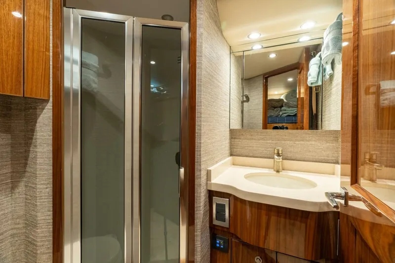 Slide: The Image of Luxurious bathroom in 2021 Viking 68 Enclosed Bridge Convertible yacht. - 33