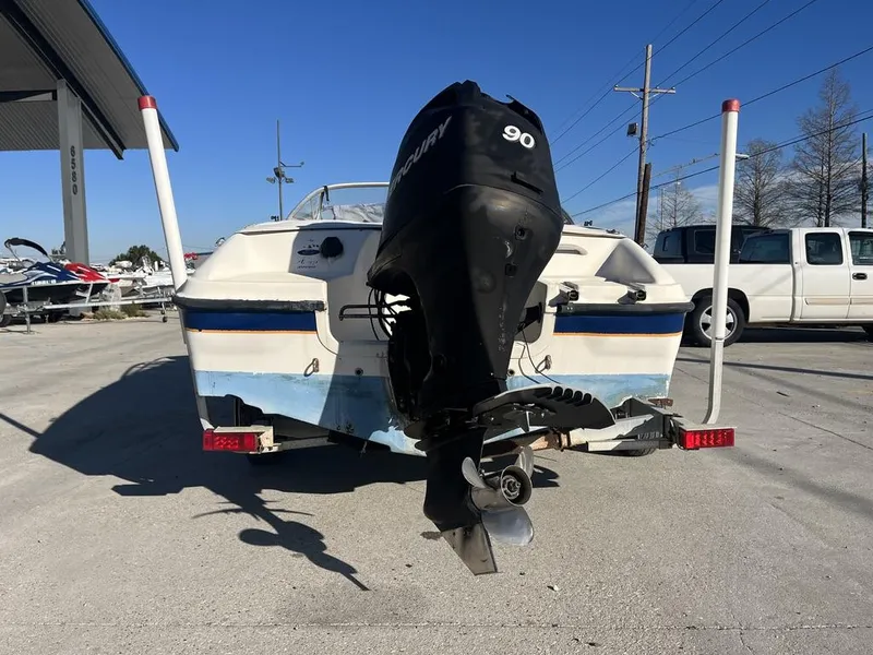 Slide: The Image of 2004 Bayliner 175 boat with outboard motor. - 5