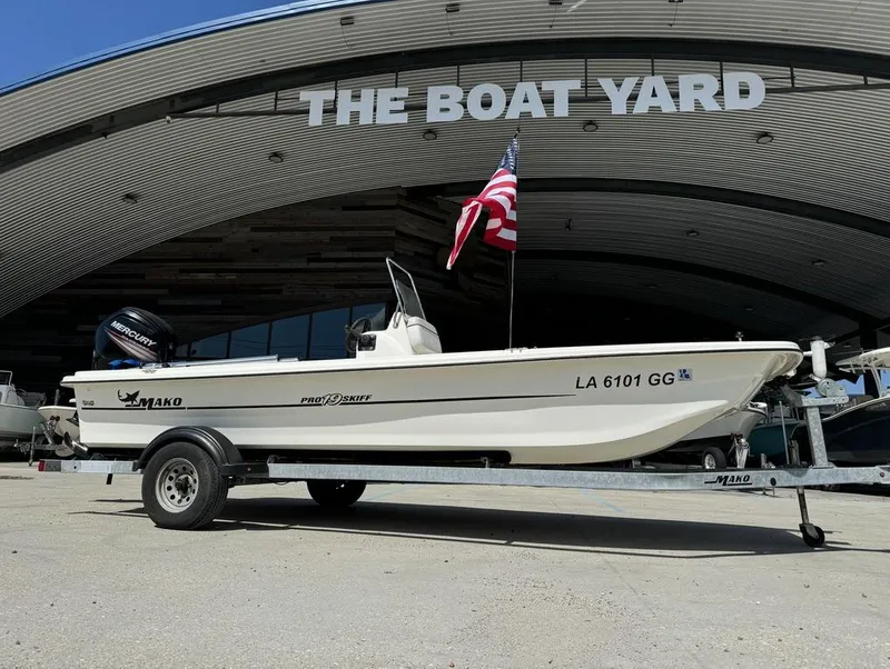 Slide: The Image of 2017 Mako Pro Skiff 19 CC boat on trailer at The Boat Yard. - 6