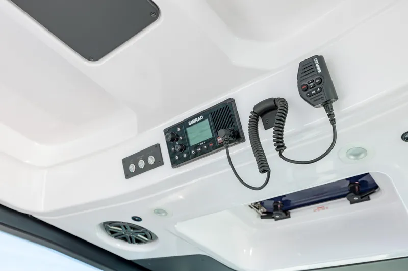 Slide: The Image of 2025 Axopar 29 CCX boat interior with radio and speaker system. - 9