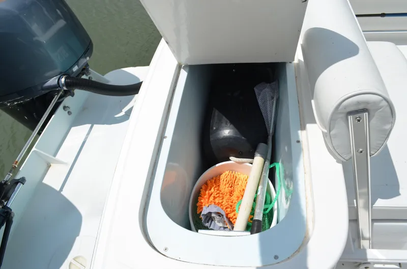 Slide: The Image of Storage compartment on 2008 Jersey Cape 31 Little Devil boat with cleaning supplies. - 24