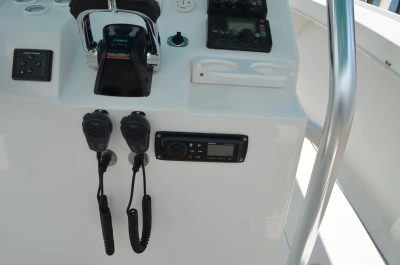 Slide: The Image of Control panel of 2008 Jersey Cape 31 Little Devil boat with communication devices. - 32