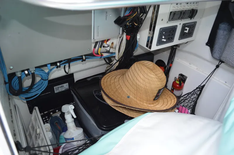 Slide: The Image of Interior of 2008 Jersey Cape 31 Little Devil boat with wiring and storage. - 39
