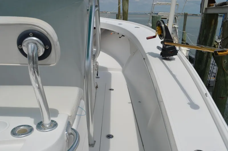 Slide: The Image of 2008 Jersey Cape 31 Little Devil boat deck with fishing equipment. - 4