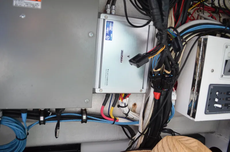 Slide: The Image of Electrical wiring and components inside a 2008 Jersey Cape 31 Little Devil boat. - 41