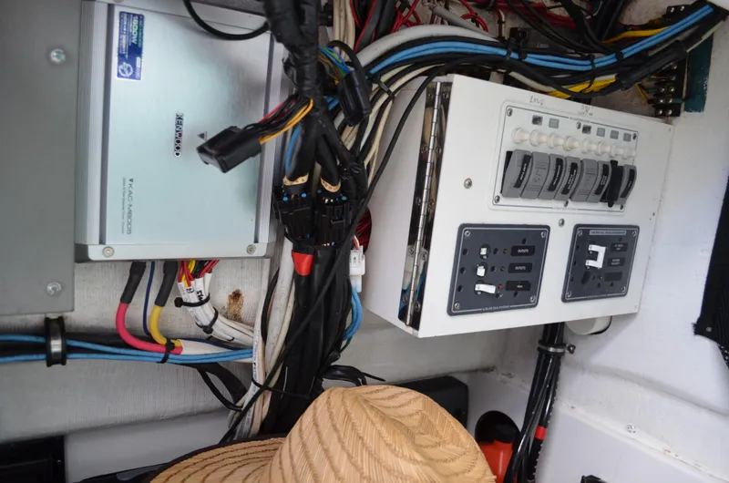 Slide: The Image of Electrical panel and wiring inside 2008 Jersey Cape 31 Little Devil boat. - 42