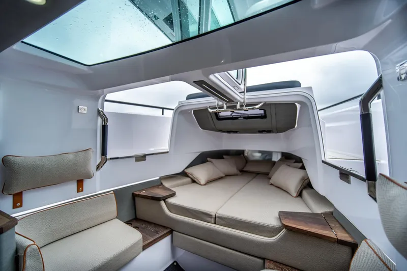 Slide: The Image of Luxurious interior of 2021 Axopar 37 XC boat with spacious seating and modern design. - 22
