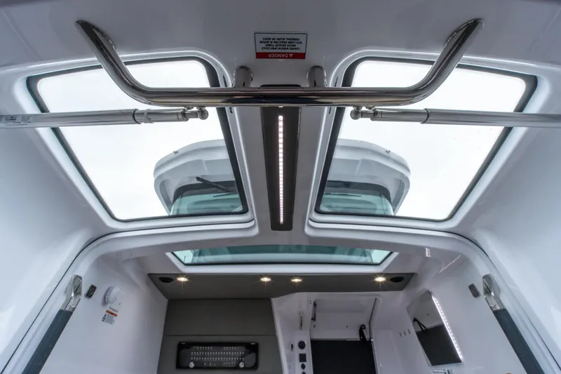 Slide: The Image of Interior view of 2021 Axopar 37 XC boat with skylights and modern design. - 23
