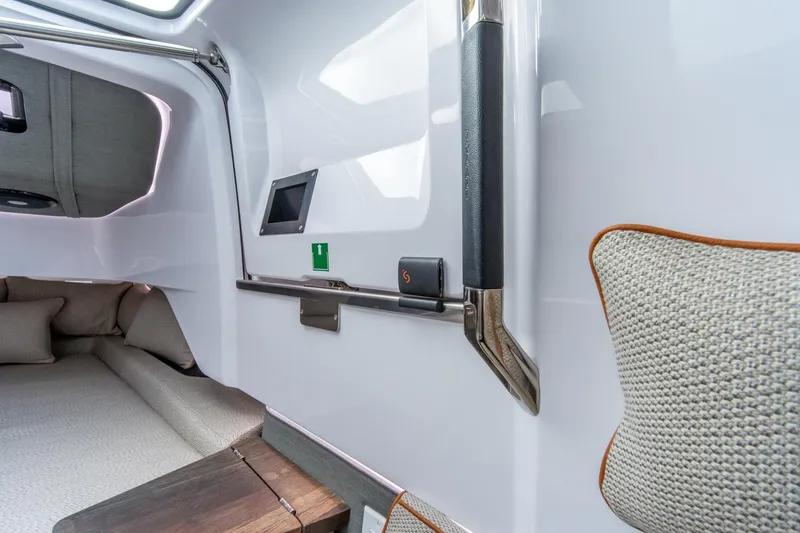 Slide: The Image of Interior of 2021 Axopar 37 XC boat, featuring modern design and comfortable seating. - 28