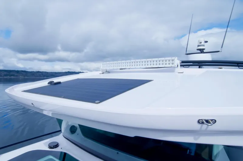 Slide: The Image of 2021 Axopar 37 XC boat roof with solar panel and radar equipment. - 29