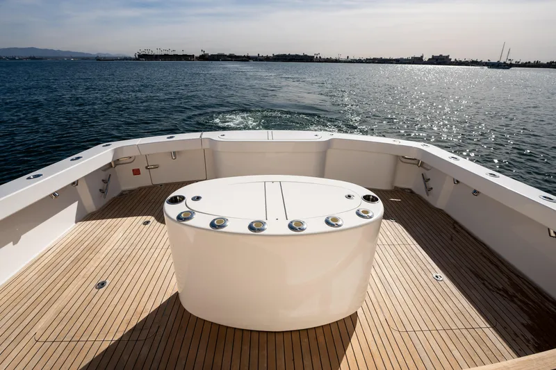 Slide: The Image of 2022 Viking 54 Convertible yacht deck with ocean view. - 46