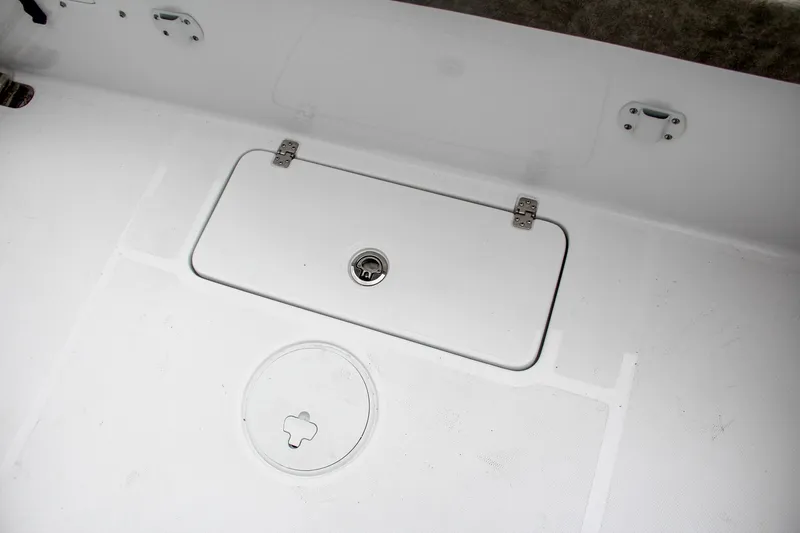 Slide: The Image of 2025 Sea Hunt Gamefish 27 boat with forward seating and storage compartments. - 15