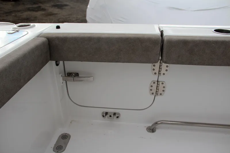 Slide: The Image of 2025 Sea Hunt Gamefish 27 Forward Seating with open storage compartment. - 22