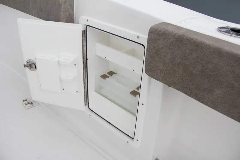 Slide: The Image of 2025 Sea Hunt Gamefish 27 boat interior with seating and storage compartments. - 27