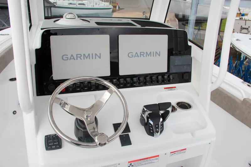 Slide: The Image of 2025 Sea Hunt Gamefish 27 boat seating, gray cushioned forward seats. - 35