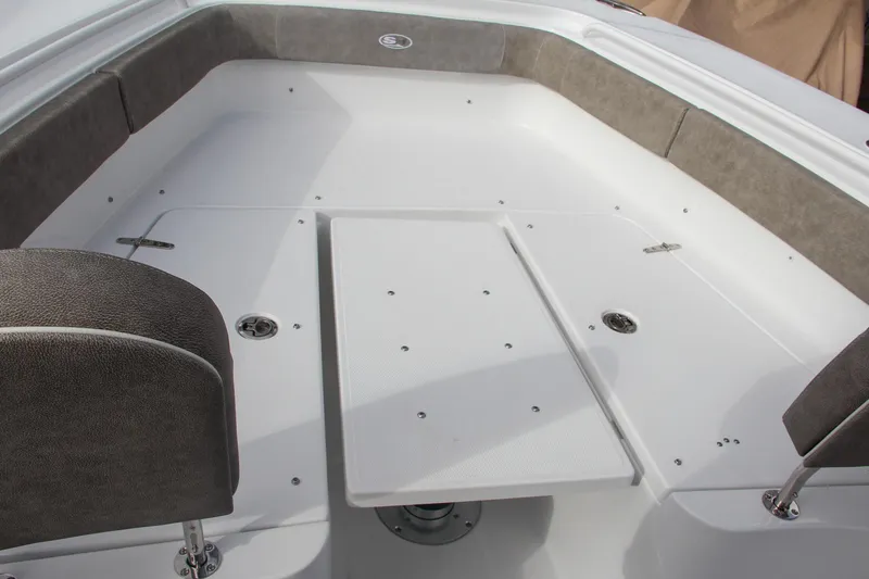 Slide: The Image of 2025 Sea Hunt Gamefish 27 boat with forward seating, docked outdoors. - 48