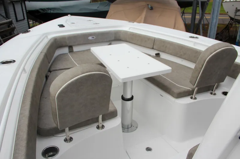Slide: The Image of 2025 Sea Hunt Gamefish 27 boat seating and rod holders. - 52