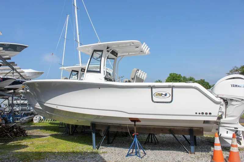 Slide: The Image of 2025 Sea Hunt Gamefish 27 boat logo and window detail. - 7