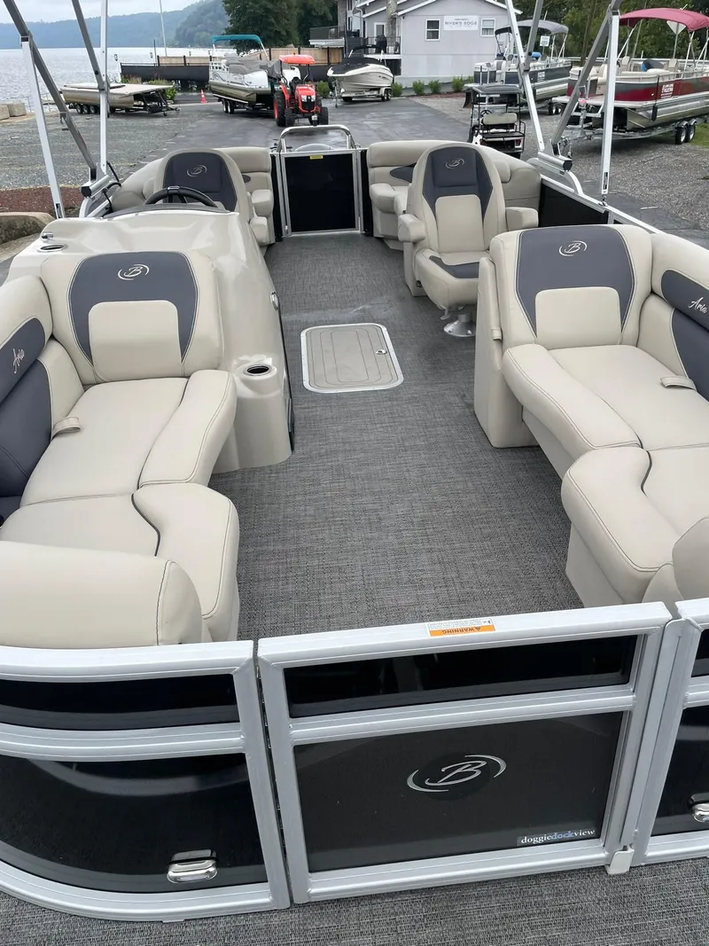 Slide: The Image of 2024 Barletta ARIA 22QC pontoon boat with spacious seating and modern design. - 12