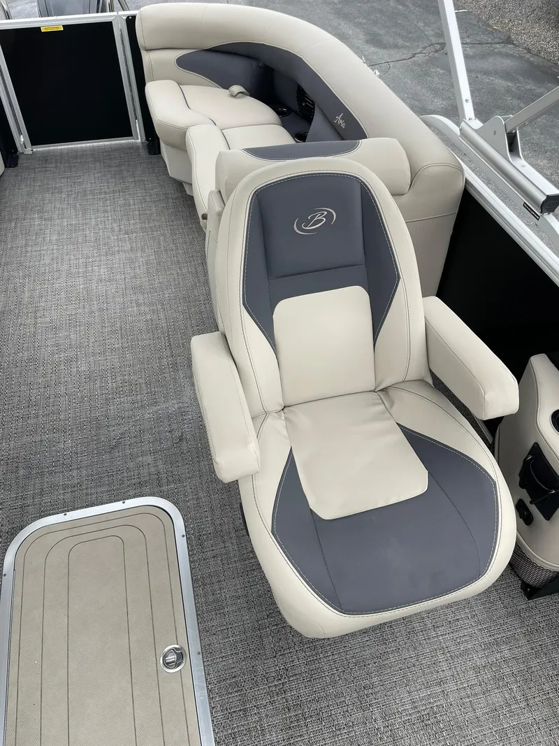 Slide: The Image of 2024 Barletta ARIA 22QC boat interior with plush seating and modern design. - 16