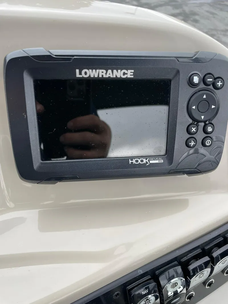 Slide: The Image of Lowrance Hook2 fish finder on 2024 Barletta ARIA 22QC boat dashboard. - 19