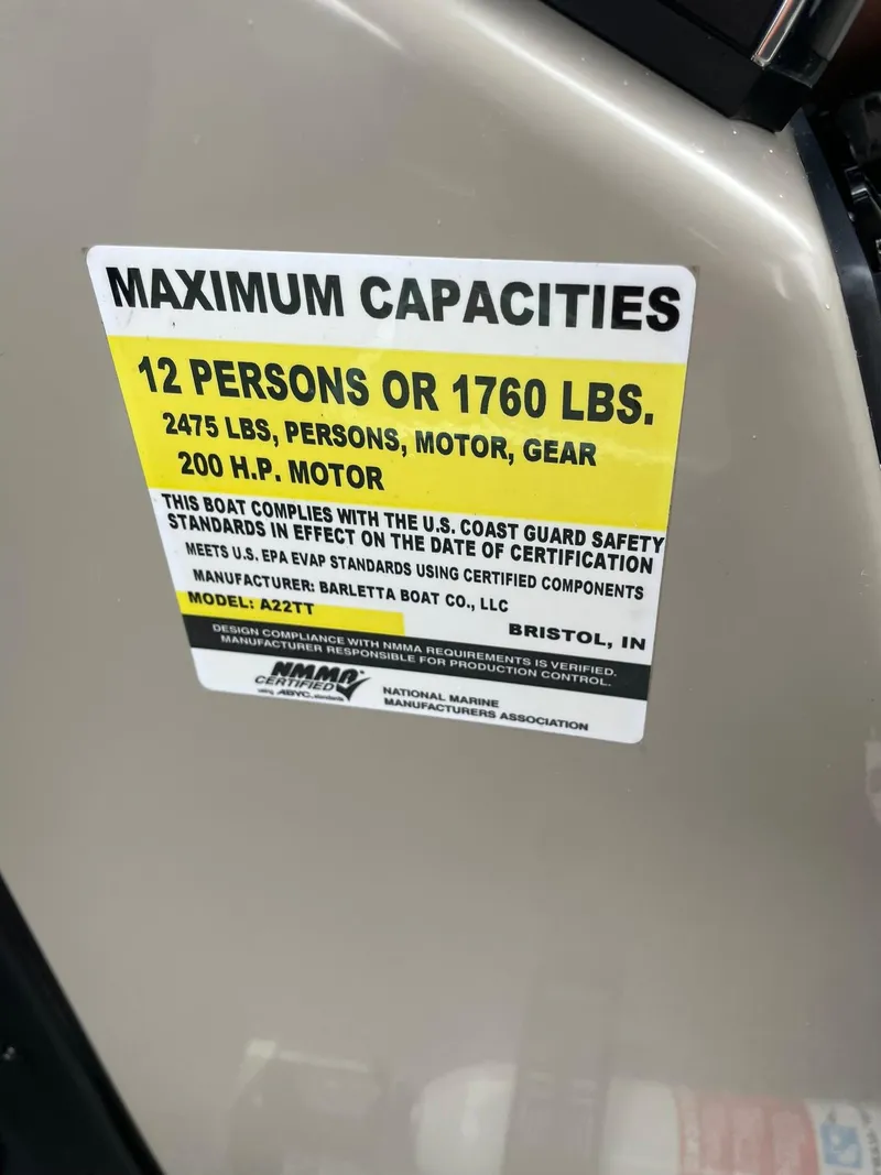 Slide: The Image of 2024 Barletta ARIA 22QC capacity label: 12 persons, 1760 lbs, 200 HP motor. - 20