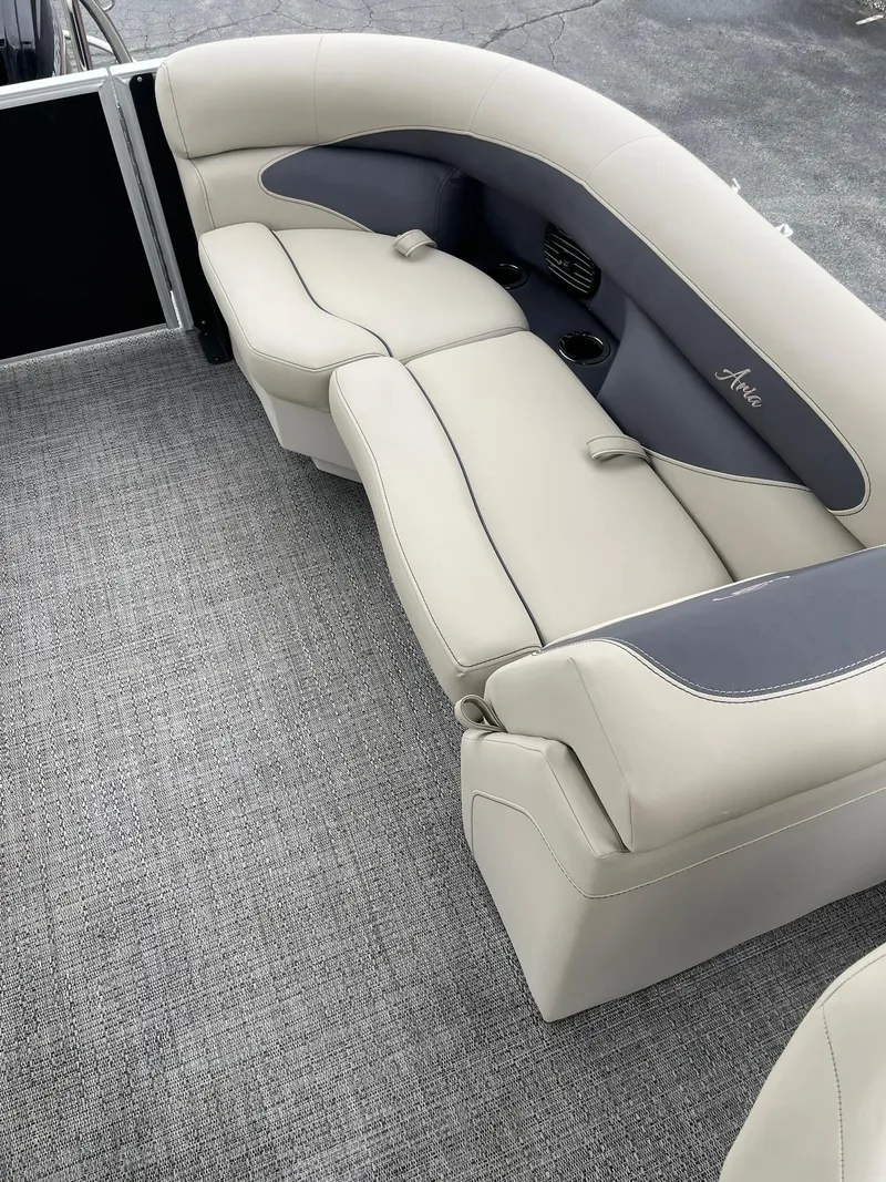 Slide: The Image of 2024 Barletta ARIA 22QC boat interior with plush seating and modern design. - 23
