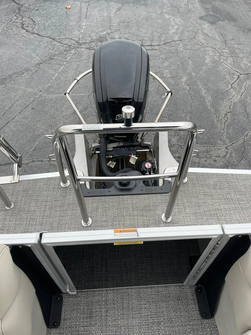 Slide: The Image of 2024 Barletta ARIA 22QC pontoon boat with outboard motor and railing. - 24