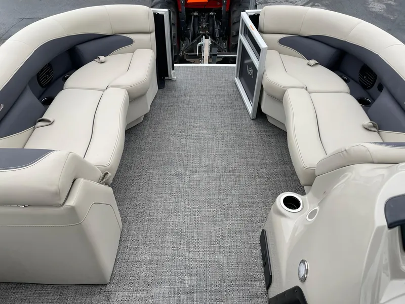 Slide: The Image of 2024 Barletta ARIA 22QC pontoon boat interior with plush seating and gray carpet. - 27