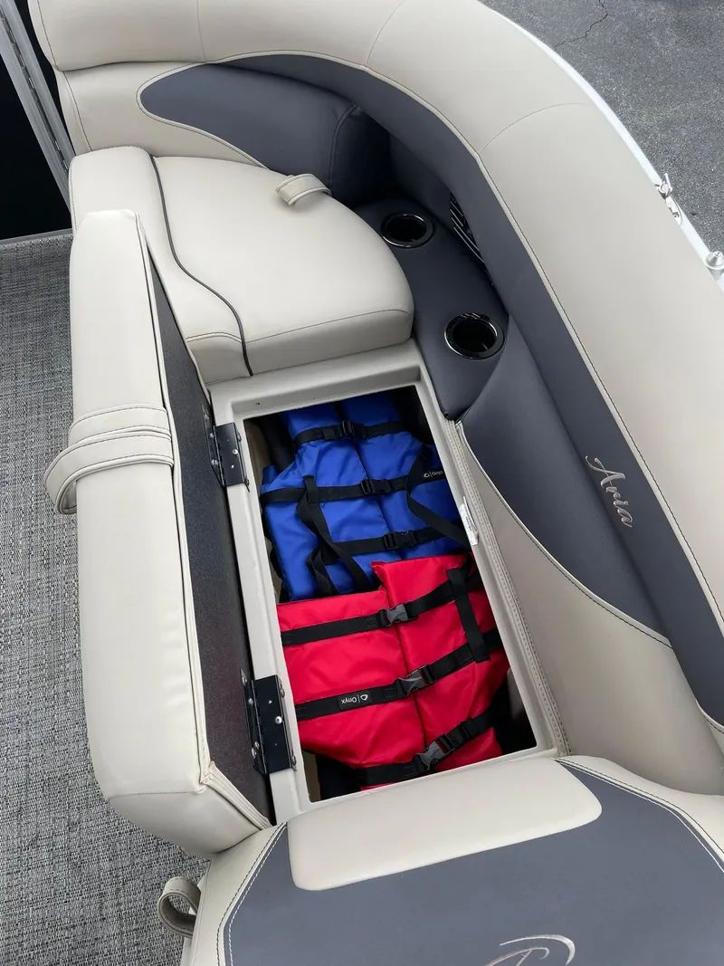Slide: The Image of 2024 Barletta ARIA 22QC boat seat storage with life jackets. - 28