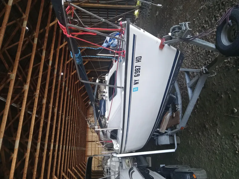 Slide: The Image of 1988 Precision 21 sailboat on trailer in storage facility. - 2