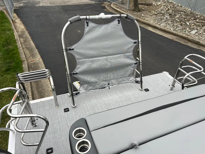 Slide: The Image of 2025 South Bay S224 UL boat deck with seating and cup holders. - 18