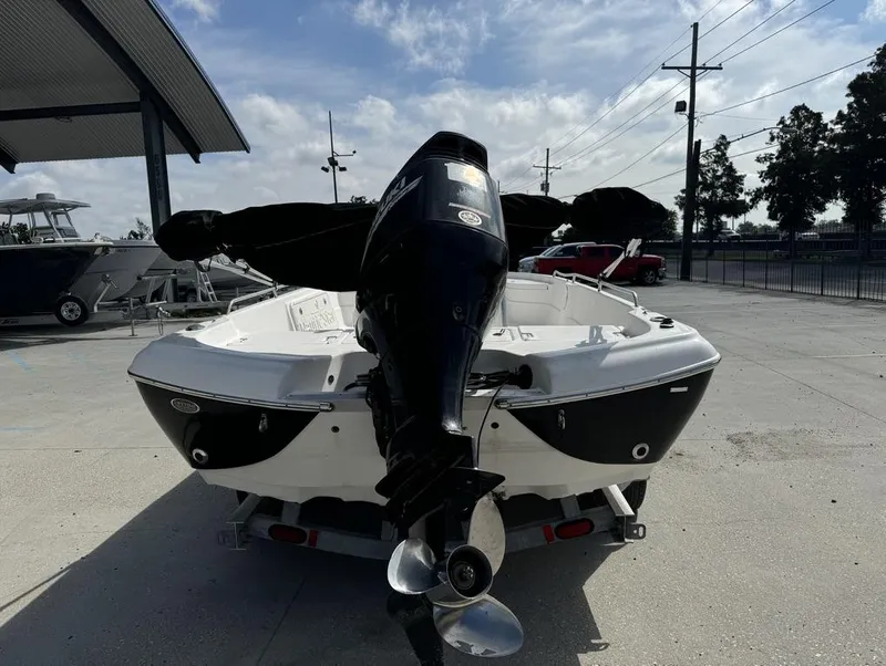 Slide: The Image of 2008 NauticStar 2200 Nauticbay boat on trailer, outdoor setting, rear view. - 12