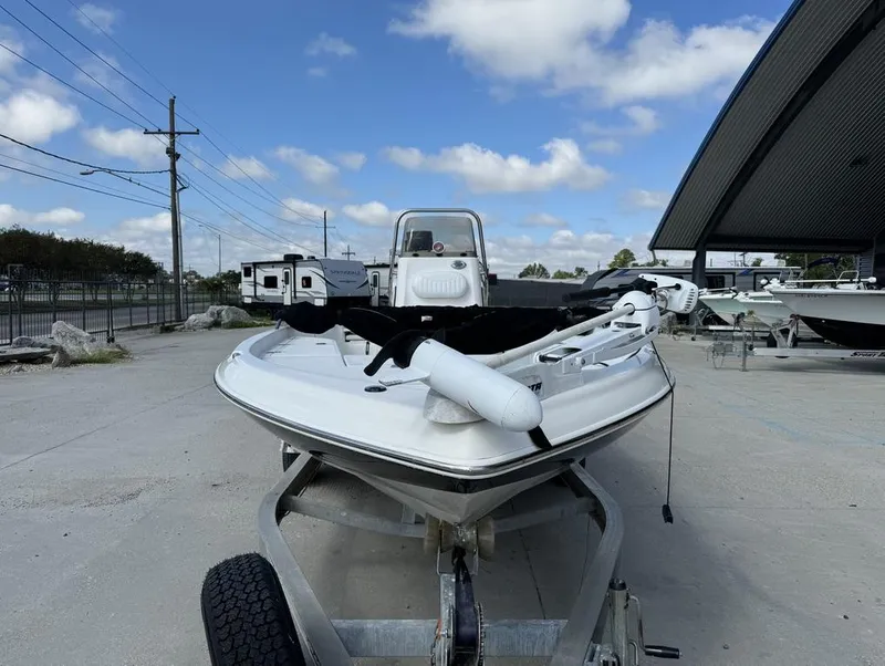 Slide: The Image of 2008 NauticStar 2200 Nauticbay boat on trailer under blue sky. - 3