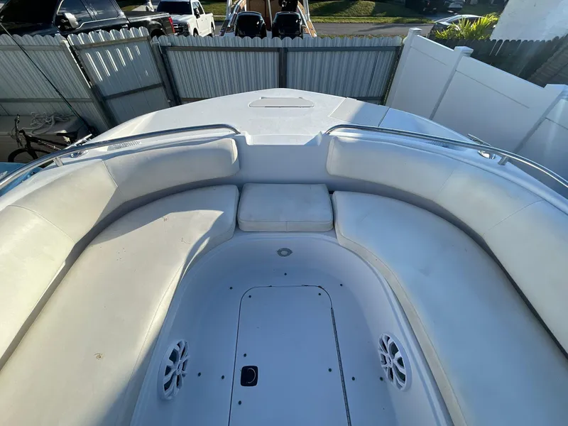Slide: The Image of 2001 Hurricane 232 OB boat with spacious seating and sleek design. - 22