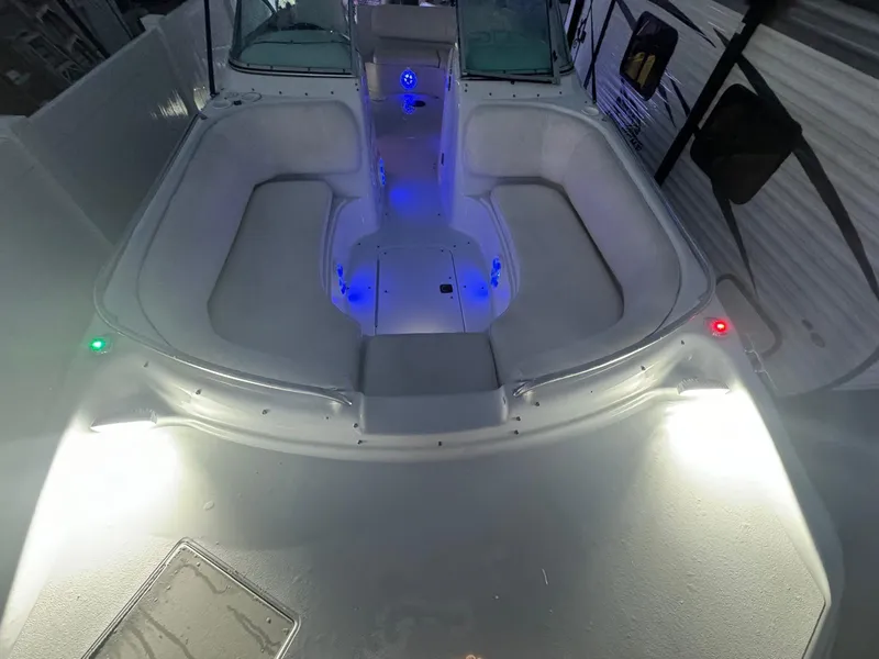 Slide: The Image of 2001 Hurricane 232 OB boat interior with blue LED lighting. - 29