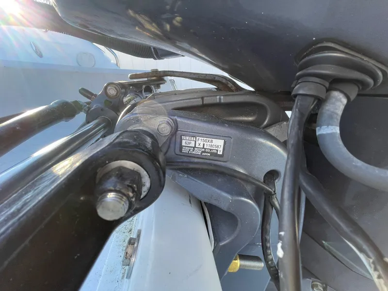 Slide: The Image of Close-up of a 2001 Hurricane 232 OB boat engine components. - 7