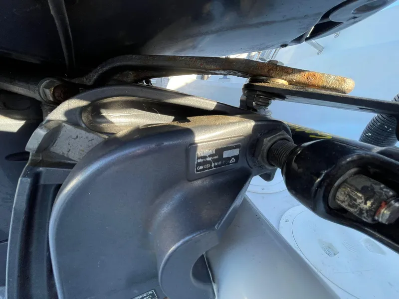 Slide: The Image of Close-up of 2001 Hurricane 232 OB boat engine components. - 8