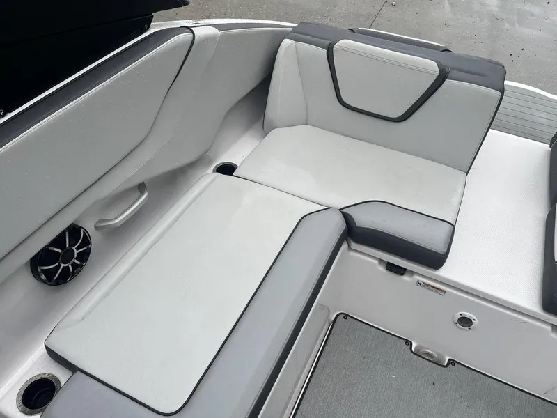 Slide: The Image of 2023 Yamaha AR250 boat interior with sleek seating and modern design. - 14