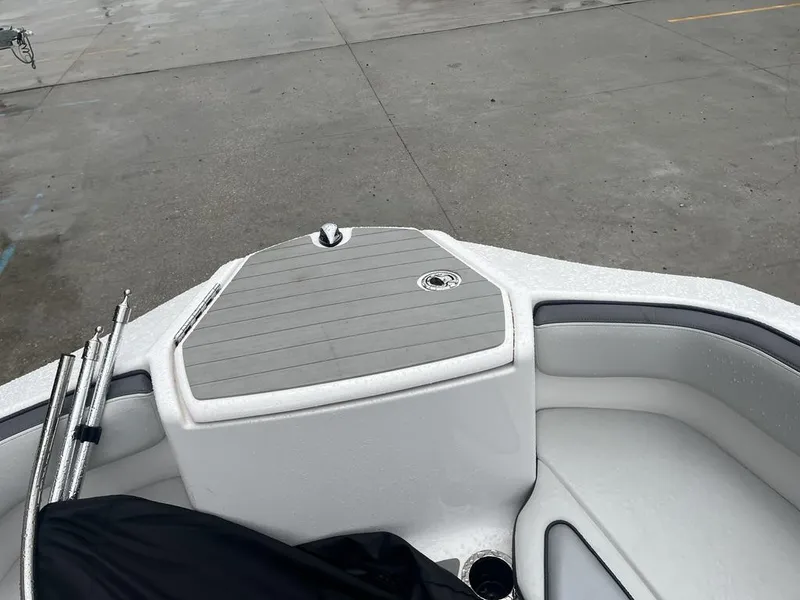 Slide: The Image of 2023 Yamaha AR250 boat bow with seating and storage compartment. - 23