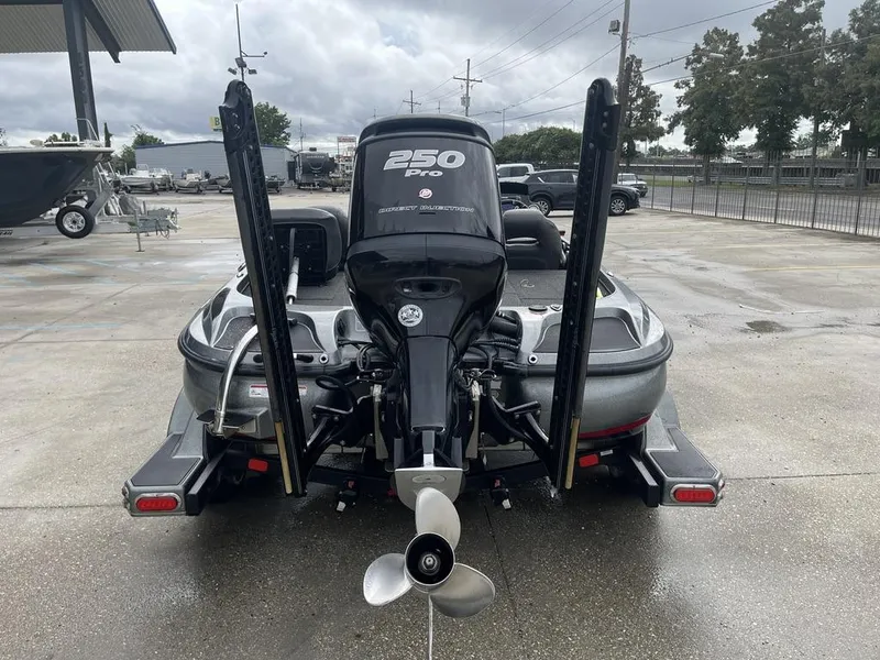 Slide: The Image of 2017 Nitro Z21 boat with 250 Pro motor in parking lot. - 14