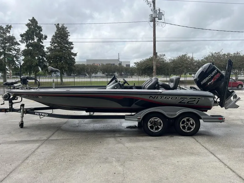 Slide: The Image of 2017 Nitro Z21 boat with Mercury Pro XS engine on trailer. - 5